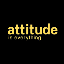 Yellow font on black background Attitude Is Everything Logo